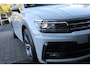 Volkswagen Tiguan 1.5 TSI 150PK AUTOMAAT HIGHLINE BUSINESS R | PANORAMA SCHUIF/KANTEL DAK | LEDEREN BEKLEDING | BESTUUDERSSTOEL ELEKTRISCH VERSTELBAAR MET GEHEUGENFUNCTIE | ELEKTRISCH WEGKLAPBARE TREKHAAK | IQ LIGHT KOPLAMPEN | VIRTUAL DISPLAY | DRAADLOZE APPLE CARPLAY/ANDROID AUTO | NAVIGATIE | 19" LICHTMETALEN VELGEN | ELEKTRISCH BEDIENBARE ACHTERKLEP | GETINTE ACHTERRUITEN | CAMERA VOOR + ACHTER | PARKEERSENSOREN VOOR + ACHTER | STOEL VERWARMING |