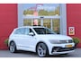 Volkswagen Tiguan 1.5 TSI 150PK AUTOMAAT HIGHLINE BUSINESS R | PANORAMA SCHUIF/KANTEL DAK | LEDEREN BEKLEDING | BESTUUDERSSTOEL ELEKTRISCH VERSTELBAAR MET GEHEUGENFUNCTIE | ELEKTRISCH WEGKLAPBARE TREKHAAK | IQ LIGHT KOPLAMPEN | VIRTUAL DISPLAY | DRAADLOZE APPLE CARPLAY/ANDROID AUTO | NAVIGATIE | 19" LICHTMETALEN VELGEN | ELEKTRISCH BEDIENBARE ACHTERKLEP | GETINTE ACHTERRUITEN | CAMERA VOOR + ACHTER | PARKEERSENSOREN VOOR + ACHTER | STOEL VERWARMING |