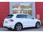 Volkswagen Tiguan 1.5 TSI 150PK AUTOMAAT HIGHLINE BUSINESS R | PANORAMA SCHUIF/KANTEL DAK | LEDEREN BEKLEDING | BESTUUDERSSTOEL ELEKTRISCH VERSTELBAAR MET GEHEUGENFUNCTIE | ELEKTRISCH WEGKLAPBARE TREKHAAK | IQ LIGHT KOPLAMPEN | VIRTUAL DISPLAY | DRAADLOZE APPLE CARPLAY/ANDROID AUTO | NAVIGATIE | 19" LICHTMETALEN VELGEN | ELEKTRISCH BEDIENBARE ACHTERKLEP | GETINTE ACHTERRUITEN | CAMERA VOOR + ACHTER | PARKEERSENSOREN VOOR + ACHTER | STOEL VERWARMING |