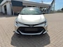Toyota Corolla 1.8 Hybrid First Edition ✅Stoel&Stuurverw.✅Adapt Cruise✅Clima✅Camera✅Navi✅Two Tone✅