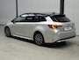 Toyota Corolla 1.8 Hybrid First Edition ✅Stoel&Stuurverw.✅Adapt Cruise✅Clima✅Camera✅Navi✅Two Tone✅