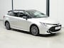 Toyota Corolla 1.8 Hybrid First Edition ✅Stoel&Stuurverw.✅Adapt Cruise✅Clima✅Camera✅Navi✅Two Tone✅