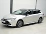 Toyota Corolla 1.8 Hybrid First Edition ✅Stoel&Stuurverw.✅Adapt Cruise✅Clima✅Camera✅Navi✅Two Tone✅