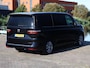 Volkswagen Multivan 1.4 eHybrid 150pk L2 Bulli Edition | 7-Pers. | Navigatie | ACC | ECC | LED | Panorama dak | Camera | App connect | Stoel en stuurverwarming | Side Assist | Elektrische Schuifdeuren |Elektrische achterklep | Alarm | DAB+ | PDC | 18" LM velgen |