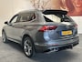 Volkswagen Tiguan Allspace 1.5 TSI HIGHLINE BUSINESS R AUTOMAAT 7 PERSOONS NAVIGATIE ADAPTIVE CRUISE CONTROL PANORAMA SCHUIF/KANTELDAK APPLE CARPLAY/ANDROID RIJSTROOKSENSOREN KEYLESS GO TREKHAAK ZEER MOOI !!