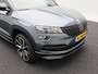 Skoda Karoq 1.5 TSi 150 Pk ACT Sportline Business | Stoel/Stuur Verwarming | Climatronic | Trekhaak | Navigatie | CarPlay | 19 Inch | 52.748 Km !!