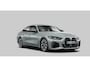 BMW i4 M50 High Executive 84 kWh Panoramadak - Active Cruise Control - Harman Kardon - Getinte Ruiten - Stuurwielrand verwarmd - Elektrisch verstelbare/verwarmde stoelen - BMW Laserlight - Comfort Access -