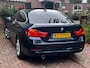 BMW 4-Serie Gran Coupe 418i Centennial High Executive | Origineel NL | Pano | Leder | Trekhaak | Navi Pro