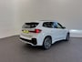 BMW iX1 eDrive20 67 kWh M Sport Edition 204pk Camera PDC Stoelverwarming Navi Hifi 18 inch M Velgen Adaptief M Onderstel