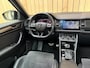 Skoda Kodiaq 1.5 TSI Sportline Business 7persoons Automaat | Panoramadak | Navigatiesysteem groot scherm | Adaptieve cruise control | Climate control | Stoelverwarming | Trekhaak uitklapbaar | Elektrisch bedienbare achterklep