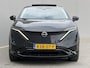 Nissan Ariya Evolve 91 kWh / SOH 99% / Stoelverwarming voor en achter / Schuif-kantel dak / Stoelventilatie / Stuurverwarming / 100% dealer onderhouden / Elektrisch verstelbare stoelen met geheugen / Elektrische achterklep / Adaptieve cruise control / Apple Carplay/Android Auto /