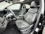 Nissan Ariya Evolve 91 kWh / SOH 99% / Stoelverwarming voor en achter / Schuif-kantel dak / Stoelventilatie / Stuurverwarming / 100% dealer onderhouden / Elektrisch verstelbare stoelen met geheugen / Elektrische achterklep / Adaptieve cruise control / Apple Carplay/Android Auto /