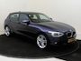 BMW 1-Serie 118i Upgrade Edition | airco | bi-xenon koplampen | cruise control | lederen bekleding | navigatiesysteem full map | voorstoelen verwarmd |