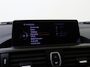 BMW 1-Serie 118i Upgrade Edition | airco | bi-xenon koplampen | cruise control | lederen bekleding | navigatiesysteem full map | voorstoelen verwarmd |