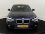 BMW 1-Serie 118i Upgrade Edition | airco | bi-xenon koplampen | cruise control | lederen bekleding | navigatiesysteem full map | voorstoelen verwarmd |