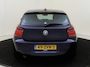 BMW 1-Serie 118i Upgrade Edition | airco | bi-xenon koplampen | cruise control | lederen bekleding | navigatiesysteem full map | voorstoelen verwarmd |