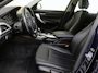 BMW 1-Serie 118i Upgrade Edition | airco | bi-xenon koplampen | cruise control | lederen bekleding | navigatiesysteem full map | voorstoelen verwarmd |