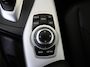 BMW 1-Serie 118i Upgrade Edition | airco | bi-xenon koplampen | cruise control | lederen bekleding | navigatiesysteem full map | voorstoelen verwarmd |