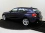 BMW 1-Serie 118i Upgrade Edition | airco | bi-xenon koplampen | cruise control | lederen bekleding | navigatiesysteem full map | voorstoelen verwarmd |