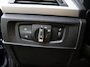 BMW 1-Serie 118i Upgrade Edition | airco | bi-xenon koplampen | cruise control | lederen bekleding | navigatiesysteem full map | voorstoelen verwarmd |