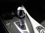 BMW 1-Serie 118i Upgrade Edition | airco | bi-xenon koplampen | cruise control | lederen bekleding | navigatiesysteem full map | voorstoelen verwarmd |