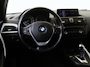 BMW 1-Serie 118i Upgrade Edition | airco | bi-xenon koplampen | cruise control | lederen bekleding | navigatiesysteem full map | voorstoelen verwarmd |