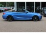 BMW 2-Serie Cabrio 220i High Exe. M Sport / 54.228 km/ NL Auto / Leder / CarPlay / Parkeerhulp V+A / 18'' / Windscherm / Sportstoelen / Stoelverwarming / DAB / Cruise Control