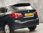 BMW 2-Serie Active Tourer 220i Executive Sport 184Pk Automaat (NAVIGATIE, CLIMATE, STOELVERWARMING, SPORTSTOELEN, PARKEERSENSOREN, CRUISE, FLIPPERS, NIEUWE APK, NIEUWSTAAT)