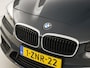 BMW 2-Serie Active Tourer 220i Executive Sport 184Pk Automaat (NAVIGATIE, CLIMATE, STOELVERWARMING, SPORTSTOELEN, PARKEERSENSOREN, CRUISE, FLIPPERS, NIEUWE APK, NIEUWSTAAT)
