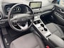 Hyundai Kona Electric EV Comfort Smart 39 kWh / Fabrieksgarantie tot 05-2027 / Dealer onderhouden / Accu SoH 99% / CCS snel laden / Navigatie / Apple Carplay Android / Stuur- en stoelverwarming /