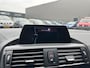 BMW 1-Serie 116i Upgrade Edition AUTOMAAT LEER OPEN DAK