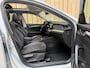 Skoda Octavia Combi 1.0 e-TSI Business Edition Plus Automaat | Panoramadak | Leer/alcantara bekleding | Stoel- en stuurverwarming | Achteruitrijcamera | Elektrisch uitklapbare trekhaak | Sfeerverlichting | Adaptieve cruise control