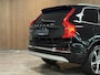 Volvo XC90 T8 AWD Recharge Inscription | Luchtvering | Trekhaak | 360 Camera | Harman Kardon | Adaptieve Cruise Control | Stoelverwarming voor+achter | Stuurwielverwarming | Schuifdak | 22 Inch | Full LED Meesturende koplampen | Standkachel met Volvo On Call App | Gelamineerde/geluidwerende zijruiten | Pilot Assist | BLIS Dode Hoek Detectie | Elektrische voorstoelen geheugen | Lederen bekleding | Zitting verlenging voorstoelen | Keyless Drive | Parkeersensoren voor+achter | Privacy Glass | Elektrisch bedienbare achterklep | Geïntegreerde zongordijnen achterportieren | Geïntegreerd kinderzitje achterin | 7-Persoons | 4-Zone Climate Control | DAB Radio | Apple Carplay/Android Auto | Alarm Klasse III | Volvo On Call met mobiele App functie | Onyx Black Metallic |