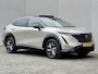 Nissan Ariya Evolve 91 kWh / SOH 99% / Stoelverwarming voor en achter / Schuif-kantel dak / Stoelventilatie / Stuurverwarming / 100% dealer onderhouden / Elektrisch verstelbare stoelen met geheugen / Elektrische achterklep / Adaptieve cruise control / Apple Carplay/Android Auto / Navigatie /