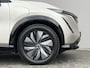 Nissan Ariya Evolve 91 kWh / SOH 99% / Stoelverwarming voor en achter / Schuif-kantel dak / Stoelventilatie / Stuurverwarming / 100% dealer onderhouden / Elektrisch verstelbare stoelen met geheugen / Elektrische achterklep / Adaptieve cruise control / Apple Carplay/Android Auto / Navigatie /