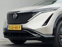 Nissan Ariya Evolve 91 kWh / SOH 99% / Stoelverwarming voor en achter / Schuif-kantel dak / Stoelventilatie / Stuurverwarming / 100% dealer onderhouden / Elektrisch verstelbare stoelen met geheugen / Elektrische achterklep / Adaptieve cruise control / Apple Carplay/Android Auto / Navigatie /