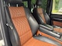 Mercedes-Benz G-klasse G63 AMG Designo l Parelmoer l Carbon l Schuifdak l ACC l Alcantara l Camera l Trekhaak l Entertainment