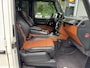 Mercedes-Benz G-klasse G63 AMG Designo l Parelmoer l Carbon l Schuifdak l ACC l Alcantara l Camera l Trekhaak l Entertainment