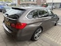 BMW 3-Serie 320i High Executive HUD SPORT STOELEN LEER NETTE AUTO NAP