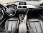 BMW 3-Serie 320i High Executive HUD SPORT STOELEN LEER NETTE AUTO NAP