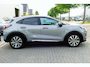 Ford Puma 1.0 EcoBoost Hybrid Titanium X. Panodak, Adap Cruise, B&O, Haak 1100kg, Stoel&StuurVerw, 18"LMV