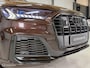 Audi Q7 60 TFSI e quattro Competition S-Line | Pano | Matrix | Soft-Close | Luchtvering | B&O | Exclusive | 22" | Stoelverwarming & -koeling | 456 PK