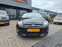 Ford Focus 1.6 EcoBoost Titanium | Slechts 58.981 km! | Met o.a. bruin lederen bekleding, navigatie, bluetooth, climate en cruise!