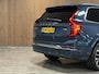 Volvo XC90 T8 AWD Recharge Ultra Bright | Luchtvering | Stoelventilatie | Trekhaak | 360 Camera | Head-Up Display | Stoelmassage | Harman Kardon | 455pk | Adaptieve Cruise Control | Stoelverwarming voor+achter | Stuurwielverwarming | Schuifdak | Full LED Meesturende koplampen | Pilot Assist | BLIS Dode Hoek Detectie | Alcantara hemelbekleding | Lederen zonnekleppen en handgrepen | Elektrische voorstoelen geheugen | Nappa Lederen bekleding | Zitting verlenging voorstoelen | Lederen dashboard | 21 Inch | Google Infotainment | Keyless Drive | Privacy Glass | Elektrisch bedienbare achterklep | Geïntegreerd kinderzitje achterin | Geïntegreerde zongordijnen achterportieren | Verlichte instaplijsten | 7-Persoons | 4-Zone Climate Control | DAB Radio | Apple Carplay/Android Auto | Alarm Klasse III | Denim Blue Metallic |