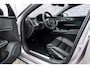 Volvo V60 T6 Plug-in hybrid AWD Ultra Dark | Heico bodykit | Google | Long Range | Schuif-/Kanteldak | Adaptieve Cruise Control | DAB | Head-Up Display | Camera | Stoelverwarming Voor + Achter | Harman Kardon Audio | Getint Glas | Zitverlenging | Elek. Stoelen | Memory | 19" LM
