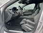 Volvo V60 T6 Plug-in hybrid AWD Ultra Dark | Heico bodykit | Google | Long Range | Schuif-/Kanteldak | Adaptieve Cruise Control | DAB | Head-Up Display | Camera | Stoelverwarming Voor + Achter | Harman Kardon Audio | Getint Glas | Zitverlenging | Elek. Stoelen | Memory | 19" LM