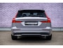 Volvo V60 T6 Plug-in hybrid AWD Ultra Dark | Heico bodykit | Google | Long Range | Schuif-/Kanteldak | Adaptieve Cruise Control | DAB | Head-Up Display | Camera | Stoelverwarming Voor + Achter | Harman Kardon Audio | Getint Glas | Zitverlenging | Elek. Stoelen | Memory | 19" LM