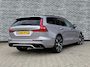 Volvo V60 T6 Plug-in hybrid AWD Ultra Dark | Heico bodykit | Google | Long Range | Schuif-/Kanteldak | Adaptieve Cruise Control | DAB | Head-Up Display | Camera | Stoelverwarming Voor + Achter | Harman Kardon Audio | Getint Glas | Zitverlenging | Elek. Stoelen | Memory | 19" LM