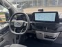 Ford E-Transit Custom 340 L2H1 Limited 71 kWh | SCI | 218pk | Laadvloer bescherming | 12-weg verstel- en verwarmbare AGR bestuurders- en passagiersstoel Laadvloer bescherming,12-weg verstel- en verwarmbare AGR bestuurders- en passagiersstoel | Trekhaakvoorbereiding | 17 inch lichtmetalen velgen (Carbonised Grey) | Driver Assistent Pack Ultimate | AGM accu | BEV 3-fase oplaadkabel (mode 3, 32A, 10m)