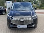 Ford E-Transit Custom 340 L2H1 Limited 71 kWh | SCI | 218pk | Laadvloer bescherming | 12-weg verstel- en verwarmbare AGR bestuurders- en passagiersstoel Laadvloer bescherming,12-weg verstel- en verwarmbare AGR bestuurders- en passagiersstoel | Trekhaakvoorbereiding | 17 inch lichtmetalen velgen (Carbonised Grey) | Driver Assistent Pack Ultimate | AGM accu | BEV 3-fase oplaadkabel (mode 3, 32A, 10m)